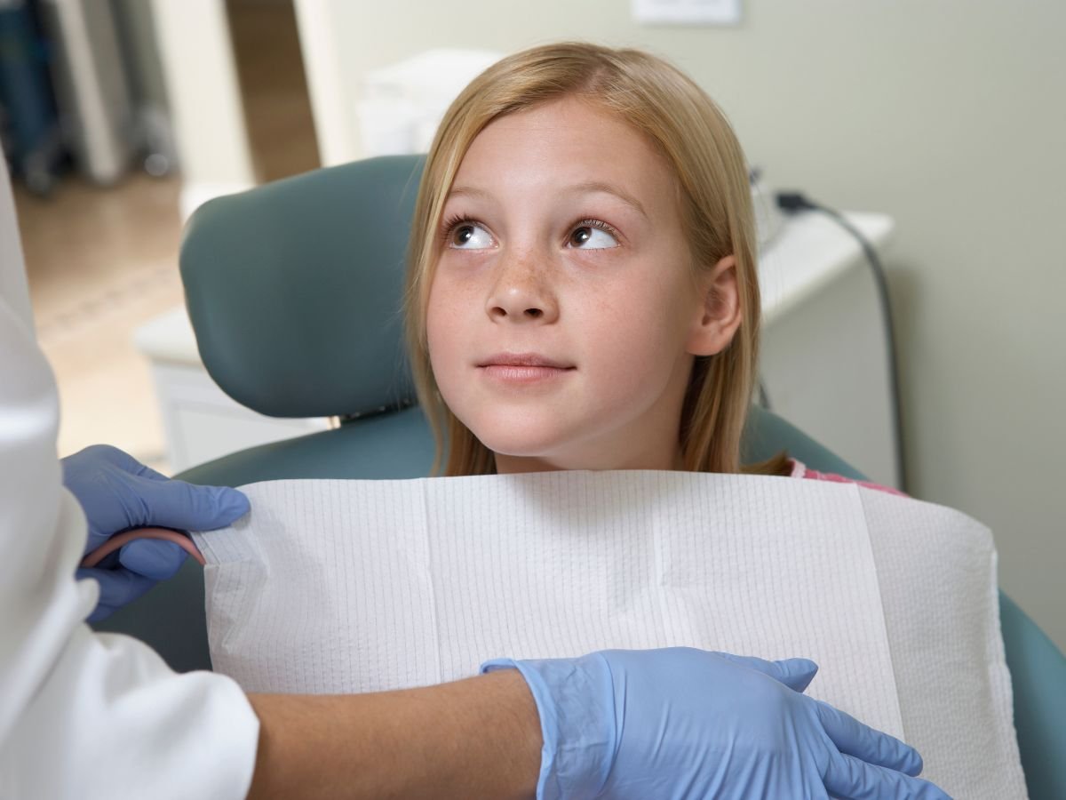 A dental patient listening to Dentist advice at Oracore dental in Odenton MD